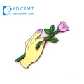 China manufacturers custom metal soft enamel elegant flower with hand shaped lapel pin for decoration